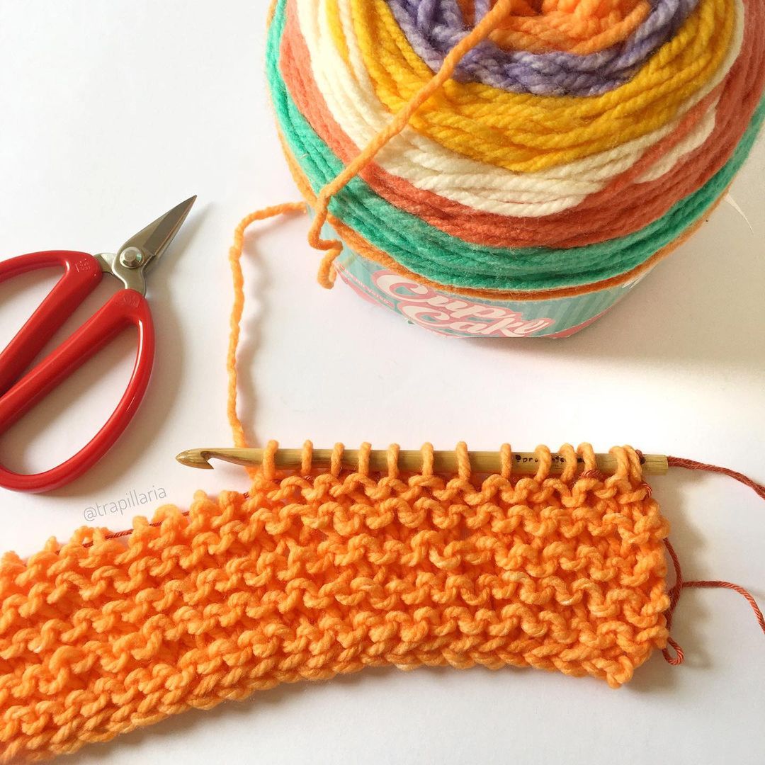 orange swatch with knooking tool