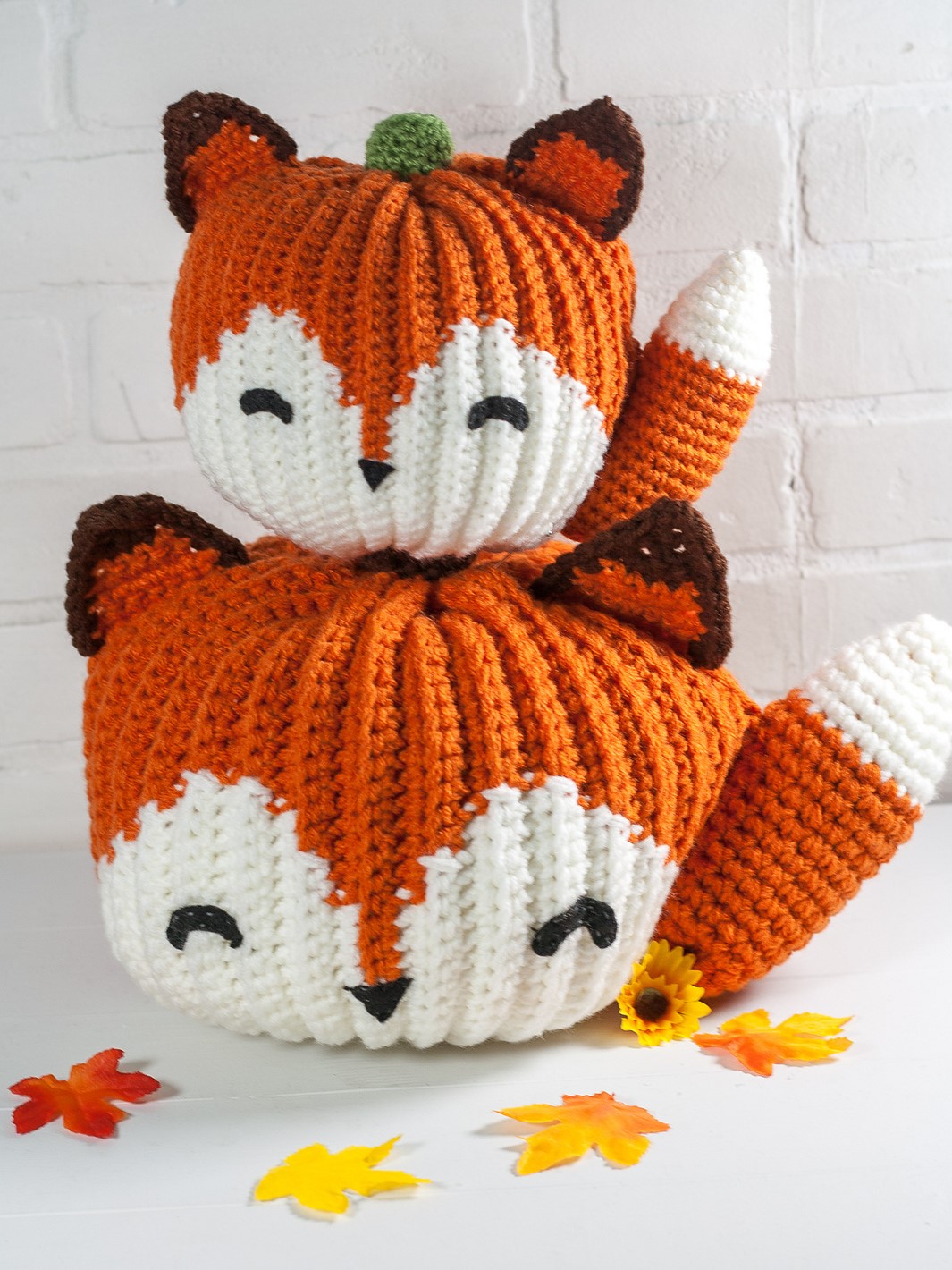 crochet foxes stacked