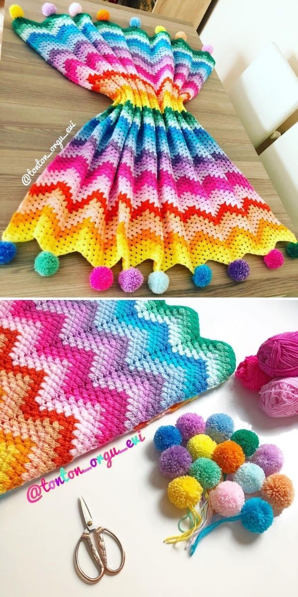 bright rainbow blanket with pompoms