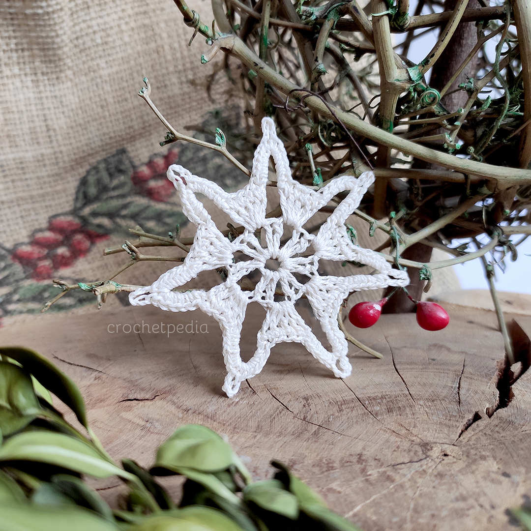 small snowflake on wood