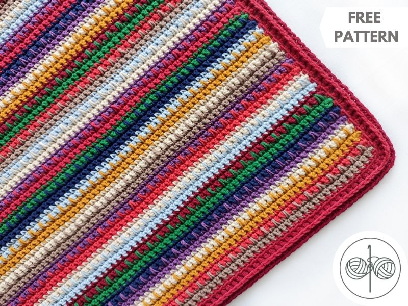 A colorful crocheted blanket with the words free pattern.