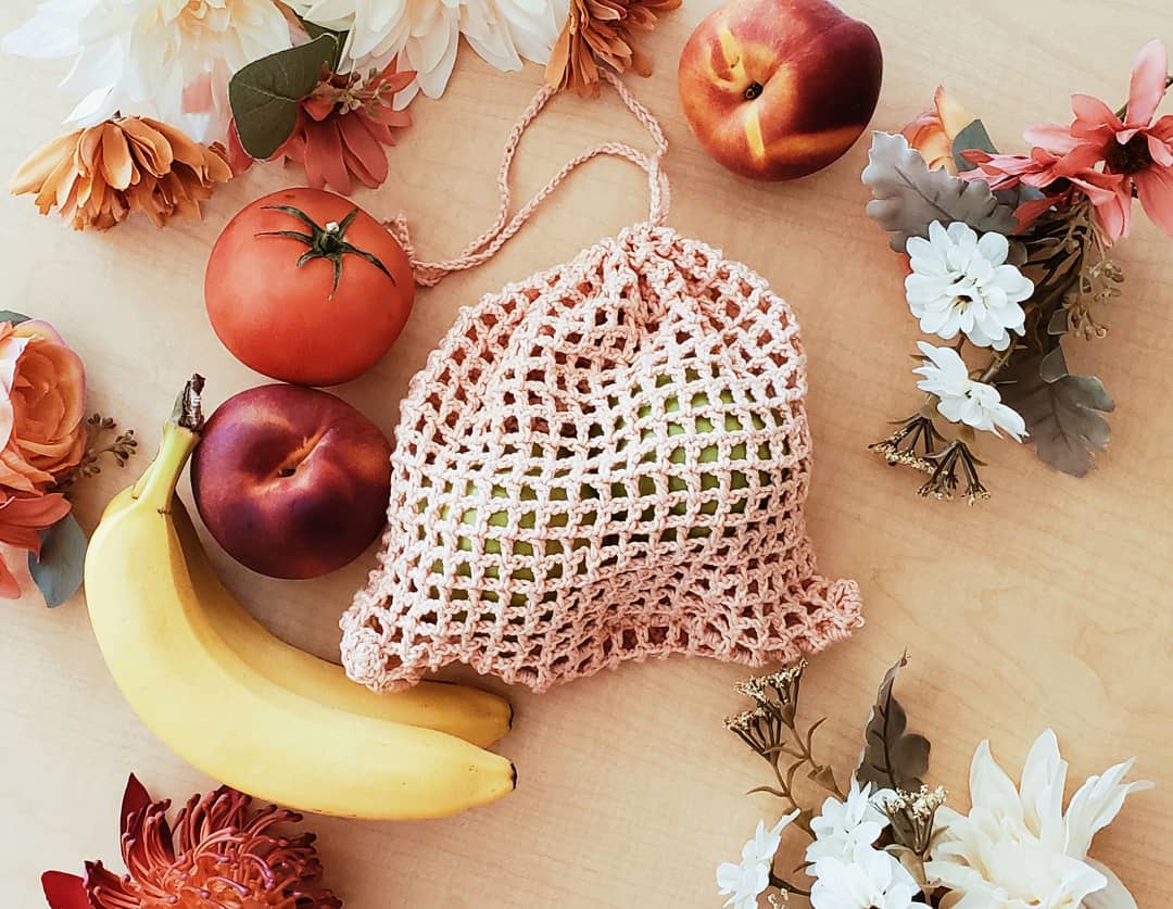 natural lacy produce bag among fruits
