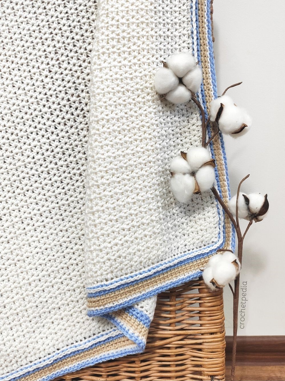 detail of white baby blanket