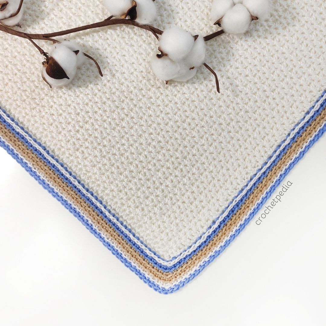 corner of a blanket with visible edging