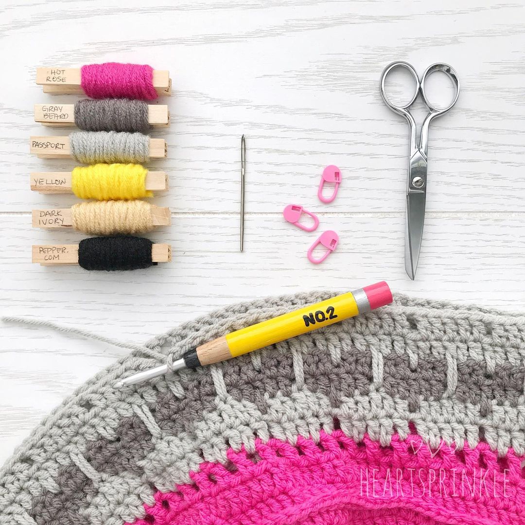 yarn swatches on bobbins