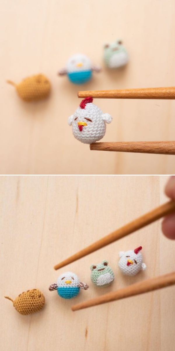 tiny egg-shaped micro crochet animals held with chopsticks 